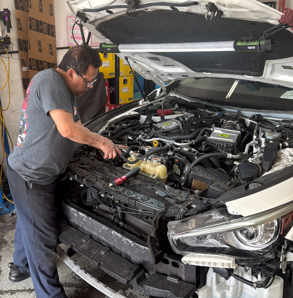 Mechanic fixing car